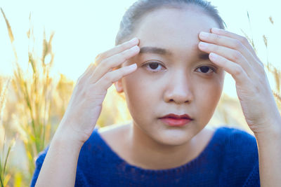 Close-up portrait of young woman