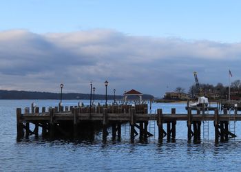 Pier on sea against sky