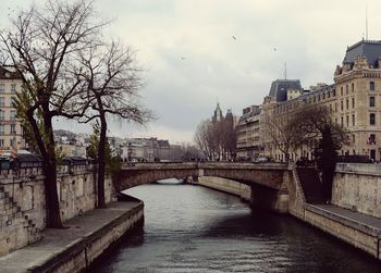 View of bridge over river in city