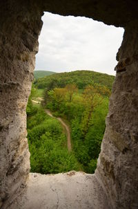 Scenic view of cliff against sky