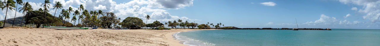 Panoramic view of beach against sky