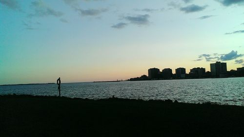 Scenic view of sea at sunset