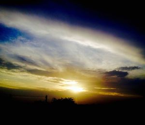 Scenic view of silhouette landscape against sky during sunset