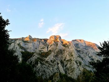 View of rocky mountains against sky