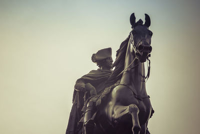 Low angle view of statue against clear sky