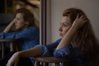 Side view of a young woman