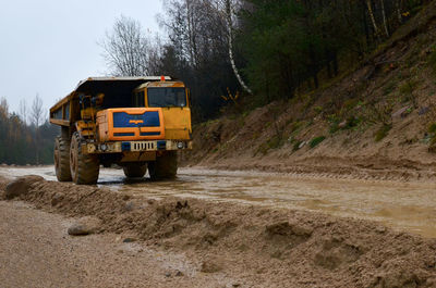 View of dirt road on land