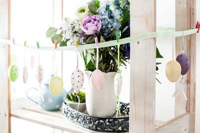 Close-up of flower vase on table