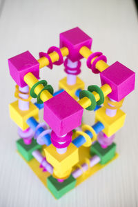 High angle view of colorful plastic toy on table