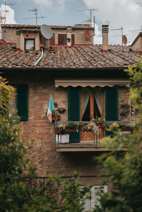 Houses in city against sky