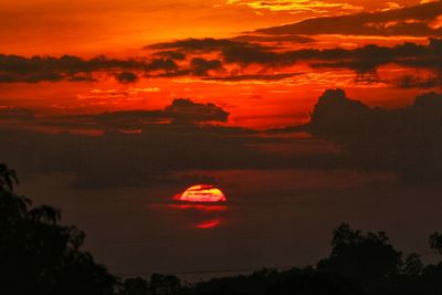 Scenic view of dramatic sky during sunset