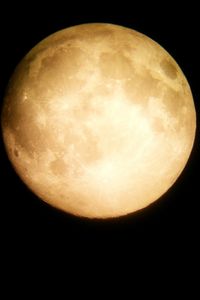 Low angle view of moon over black background