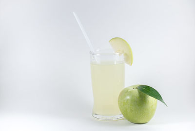 Green drink against white background