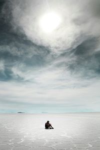 Scenic view of sea against cloudy sky