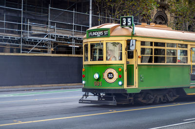 Bus stop on road in city