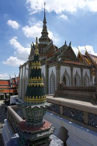 View of temple building against cloudy sky