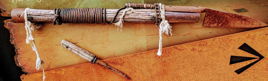 High angle view of rope tied on wall