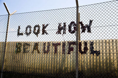 Chainlink fence against sky