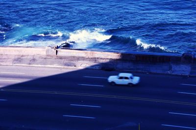 Rear view of man on sea shore