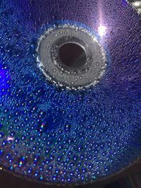 Close-up of water drops on metal