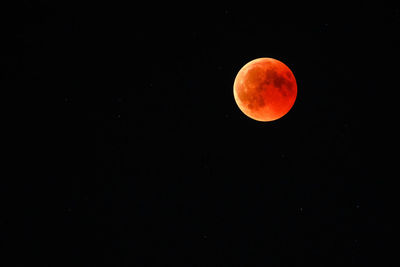 Scenic view of moon against sky at night