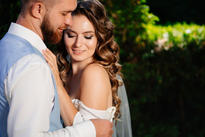 Young couple kissing outdoors