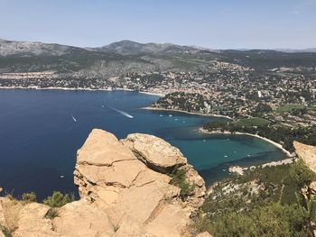 High angle view of bay against mountain range