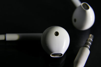 Close-up of illuminated lighting equipment on table