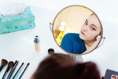 Portrait of young woman looking away