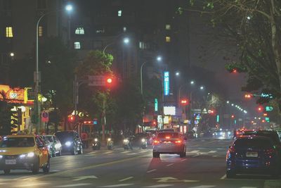 Cars on road at night