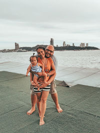 Portrait of a happy family on beach