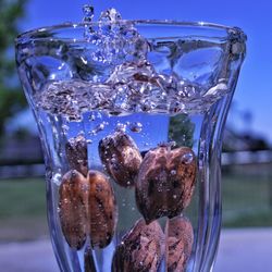 Close-up of drink in glass jar on table