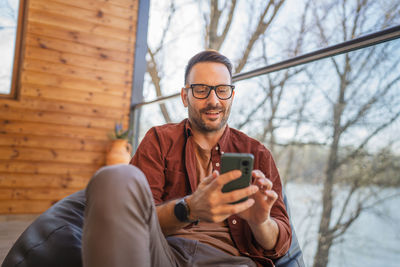 Young man using mobile phone