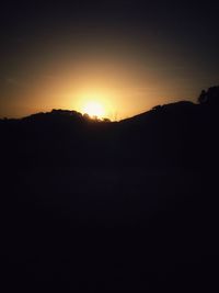 Silhouette landscape at sunset