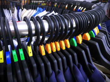 Close-up of colorful clothes hanging in row