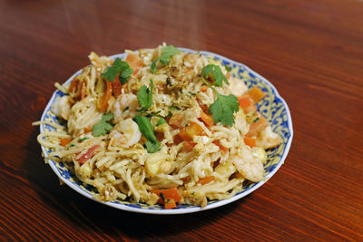 Close-up of salad in bowl on table