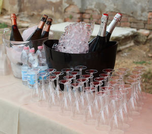 Glasses of white wine in the ice aperitif