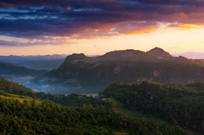 Scenic view of mountains against sky during sunset