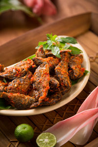 Close-up of meat on barbecue grill