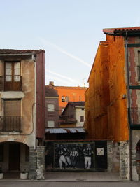 Buildings in old town against sky