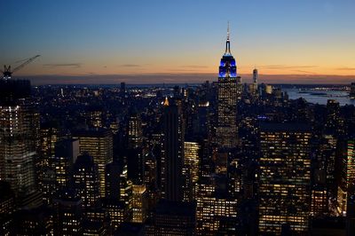 Illuminated buildings in city at night