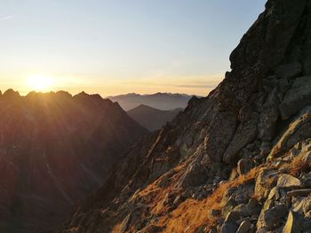 Scenic view of mountains against sky during sunset