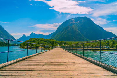 View of calm lake against mountain range