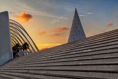 Low angle view of building against sky during sunset