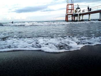 View of sea against cloudy sky