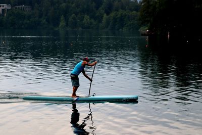 Man surfing in lake