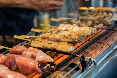 Close-up of meat on barbecue grill