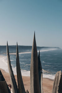 Panoramic view of sea against clear sky