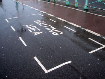 High angle view of text on road