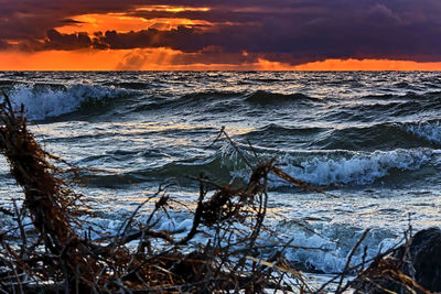 Scenic view of sea against sky during sunset